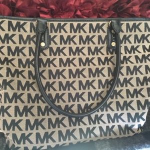 Michael Kors Large Monogram cloth and leather bag